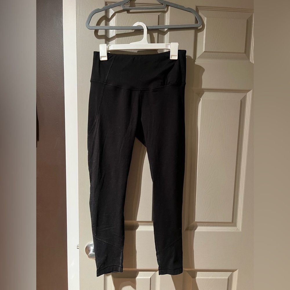 Yogalicious workout pants. Cute mesh calf detail on back. Size L.